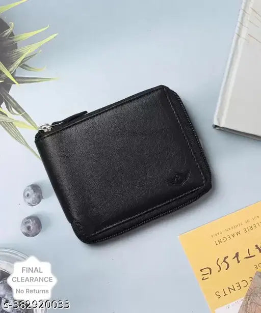 Black faux leather wallet, 4 card slots, ethically sourced genuine leather, RFID blocking technology, compact dimensions (11cm x 9.5cm), features coin pocket and note section, made in India