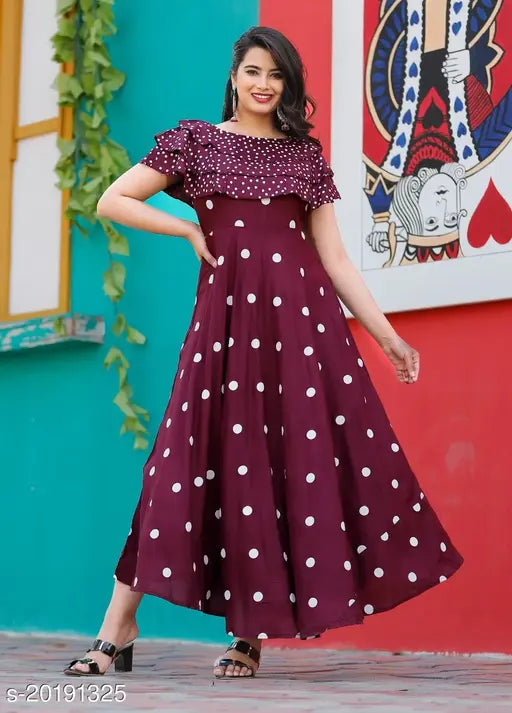 Rayon printed kurti for women, short sleeves, vibrant Indian design. M (38in bust, 53in length), L (40in bust, 53in length), XL (42in bust, 53in length), XXL (44in bust, 53in length), XXXL. Made in India