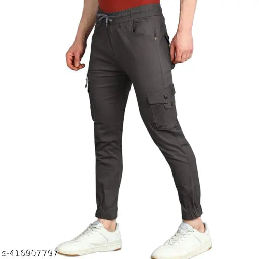 Stylish grey jogging pants with multiple pockets and a drawstring waistband