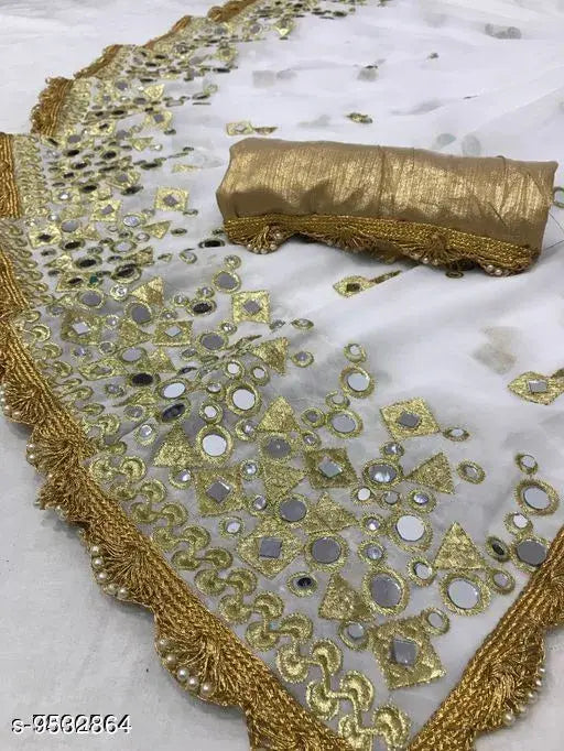 Gold embellished saree with intricate designs and detailed embroidery