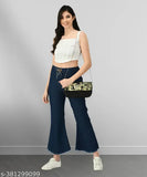Dark blue stretchable denim flared jeans with a baggy, mid-waist design, featuring an elastic waist and ankle cuffs. Plus size women's denim capris for casual wear, suitable for girls