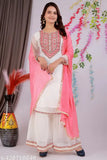 Pink embroidered sari with matching blouse