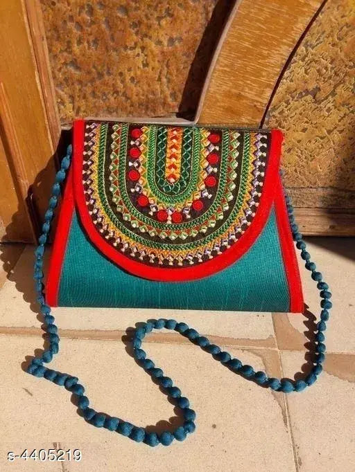 Teal and red striped woven handbag