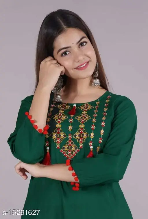 Green embroidered kurta with paisley designs, long sleeves