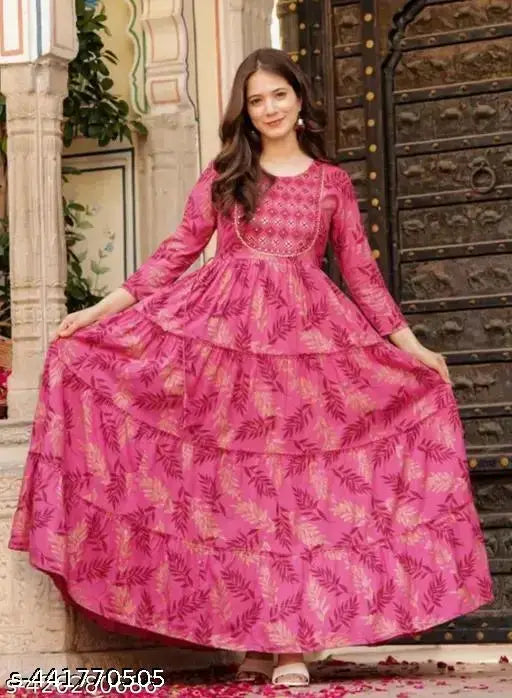 Pink rayon Anarkali-style kurti with leaf print, round neck, machine-washable, perfect for home and traditional wear