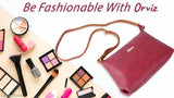 Maroon leather sling bag with shoulder strap