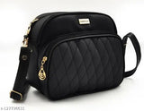 Black sling bag with multiple compartments, adjustable strap