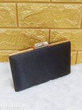 Black clutch with gold trim, perfect for formal events