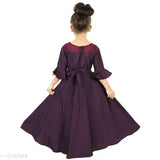 Purple long dress with flared sleeves and bow detail at waist