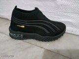 Black casual shoes with LED lights, designed for children