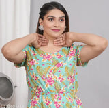 Sea green rayon jumpsuit for women, printed pattern with short sleeves and two pockets