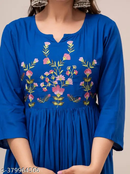 Denim blue anarkali kurta with floral embroidery, long sleeves, and a hemline