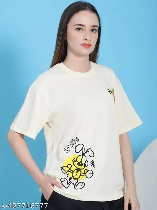 Yellow and black graphic print on a women's oversized cotton t-shirt