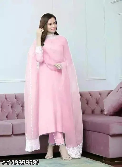 Cotton blend ethnic kurta pant set for women, Solid color, Three-Quarter Sleeves. Exclusive designer embroidery, available in multiple colors. Indian-origin, suitable for special occasions
