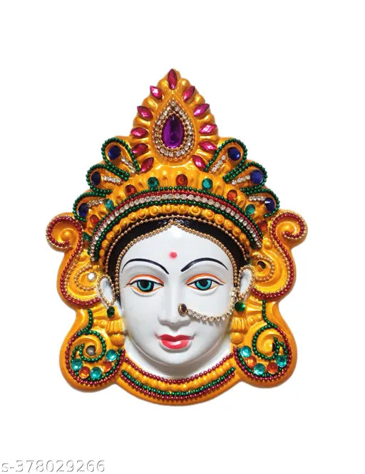 Yellow plastic figurine of Mahalakshmi Mukhota, Goddess of wealth and prosperity