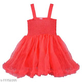 A bright red tutu dress with ruffles, designed for a young girl