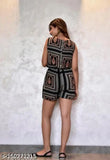 Black rayon sleeveless print jumpsuit, one size available, Indian-made fashion wear on mannequin