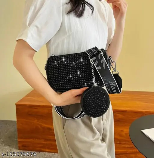 Black PU mini rhinestone decor square bag with coin purse, ideal for women/girls. Embellished, adjustable strap, glamorous style." (87 characters)