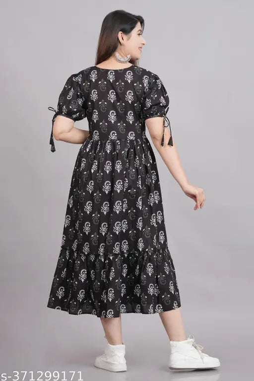 Black and white floral patterned midi dress with cold shoulder design