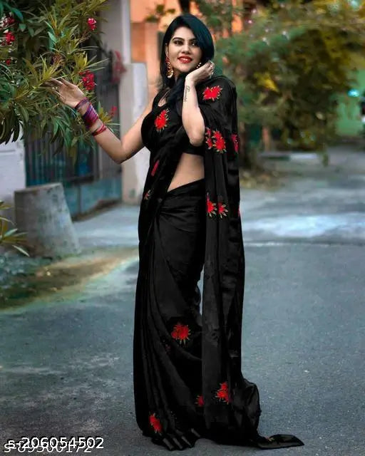 Elegant black sari with intricate embroidery design, sleeveless style
