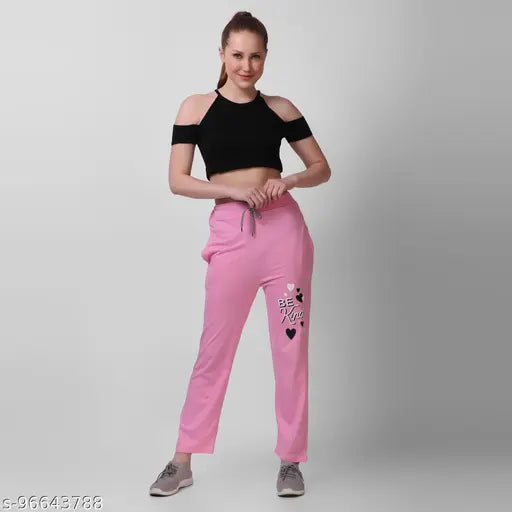 Pink crew neck sweatpants with black accents and white text