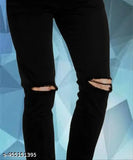 Black knee cut jeans with distressed rips