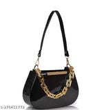 Black shoulder slingbag with chains and large round handles