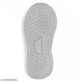 Black and white kids sports shoes with soles