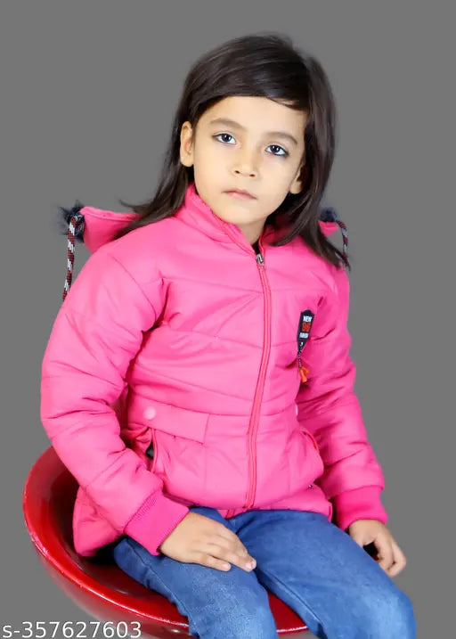 Girl in pink jacket sitting on chair
