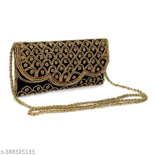 Black embroidered purse with gold chain accents