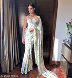 Green and white floral saree with a matching pallu