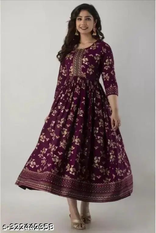 Wine-hued rayon Anarkali border print kurti with tassels, perfect for everyday casual wear or special occasions