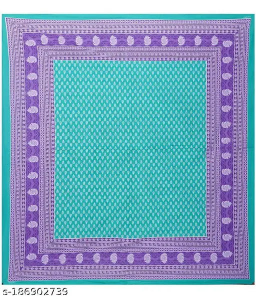 Pure cotton, printed double bedsheet with 2 pillow covers, vibrant ethnic motifs. Soft, breathable material for comfortable sleep and stylish bedding. Quality craftsmanship, machine washable, and versatile decor options. Handcrafted beauty, suitable for summer use, and inviting ambiance. Indian textile heritage and classic cotton designs
