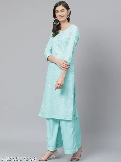 Poly crepe printed kurta palazzo set, women's polyester attire with three-quarter sleeves, ideal for parties & festivals, made in India