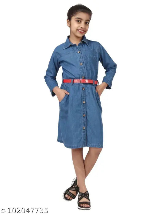 A young girl is wearing a denim blue dress, featuring a belted waist