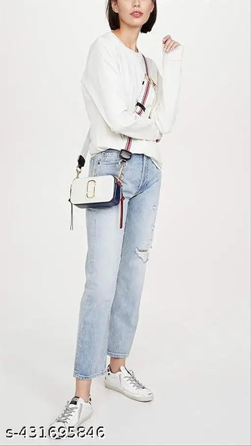 Gold tone crossbody sling bag with high-quality material, designed for women, featuring a stylish box shape and black hardware