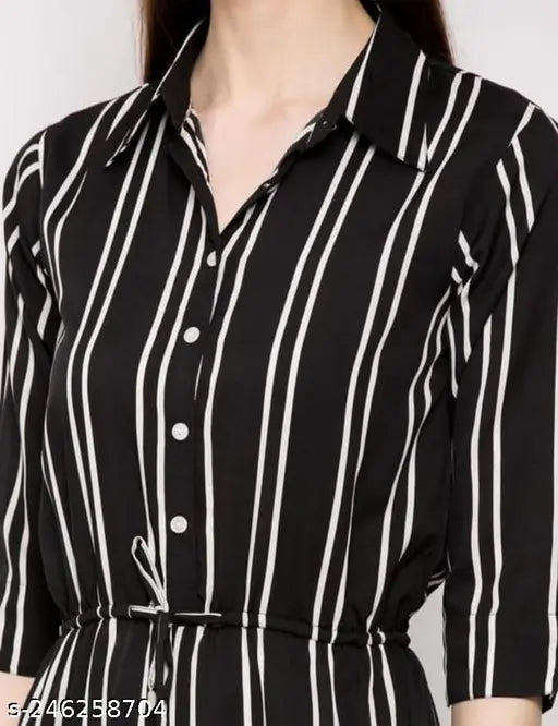 Black striped crepe jumpsuit with three-quarter sleeves, available in multiple sizes from XS to XL. Beautifully designed Indian fashion piece." (120 characters)