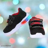Latest EVA PU knitted unisex casual lighting shoes for kids (0-5 years) with LED light design and adjustable hook & loop closure, made from high-quality breathable cotton blend material. Perfect for night outings and exploration. Sizes: 15-18 Months, 18-21 Months, 21-24 Months, 2-2.5 Years, 2.5-3 Years, 3-3.5 Years, 3.5-4 Years, 4-4.5 Years, 4.5-5 Years. Country of origin: India