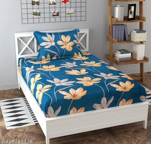 Blue floral printed bedsheet with orange pillow cover, single bed set.