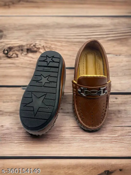 Brown leather loafer shoes with star design on sole