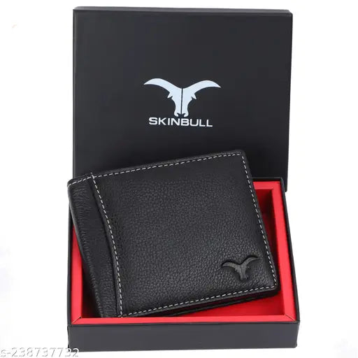 Black genuine leather RFID-protected wallet for men. Durable full-grain leather design with 2 cash compartments, 6 card slots, and multiple pockets. Compact size, ideal for everyday use or travel. Perfect gifting solution for festivals, occasions, or special events