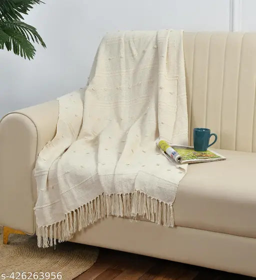 Beige cotton throw with fringe, for sofa or bed