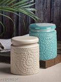 A cream and off-white ceramic jar with a lid, likely for cooking or baking storage