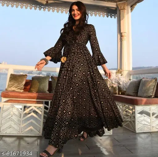 Wool petite dress with three-quarter sleeves, printed combo by Aagyeyi. Indian crop top with plazzo for a stunning traditional look