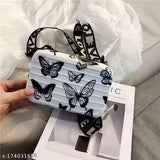 A black cosmetics bag, detachable shoulder strap, convertible into box bag, butterfly pattern, for women