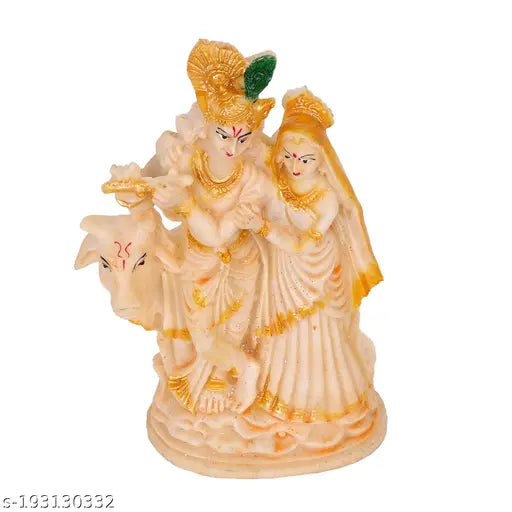 Handcrafted poly resin Radha Krishna Idol Murti with Cow Statue, ideal for temple/home/office decoration and worship. Measures 11cm (L) x 22cm (H) x 6cm (B). Perfect for festive gifting. Made in India