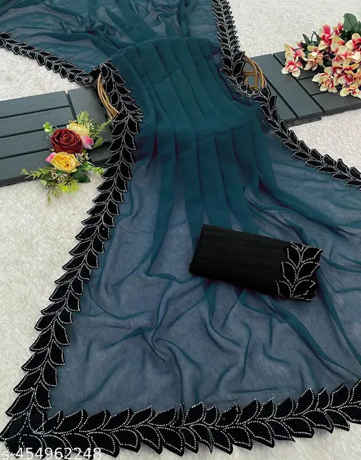 Black unstitched blouse, leaf-shaped embellishments on blue georgette saree