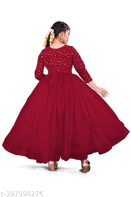 Elegant kids' net gown with long sleeves, intricate detailing, and Indian origin from Eighteen.Creation* collection
