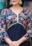 Blue rayon A line Alia kurti with pocket, features three-quarter sleeves and printed combo design. S (bust 34in, length 45in) available. Indian craftsmanship