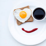 Black emoji breakfast phone case, soft silicone material, cute design.